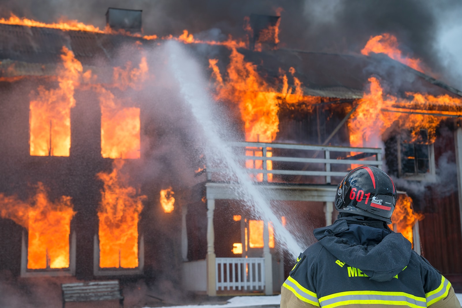 Photo by Daniel Tausis fireman watering fire
