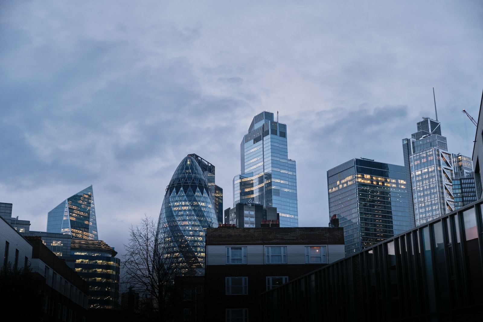 high rise buildings under gray sky