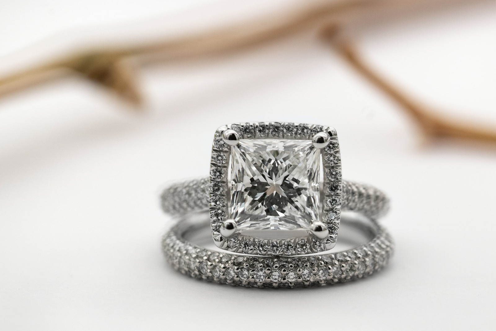 Photo by Sabrianna silver diamond studded ring on white surface